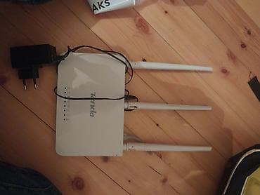 Endirim var bater var Tenda Wi‑Fi router. 3 xarici antenalı modeldir