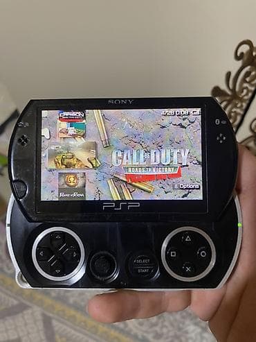 bluetooth qulaqciq: Sony PSP Go portativ oyun konsolu Ustada olmayib zavoddur bilenler — 2
