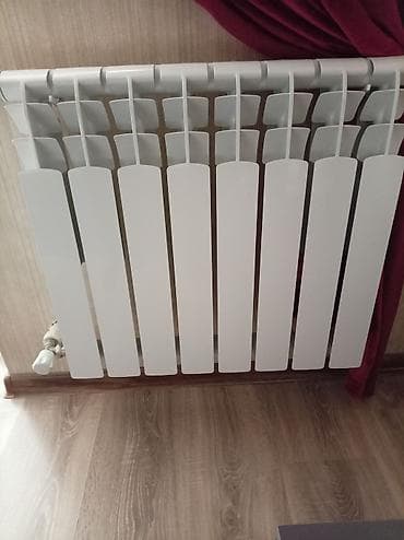 Alüminium radiator – 8 seksiyalı, ağ rəng. Xüsusiyyətlər: - Material