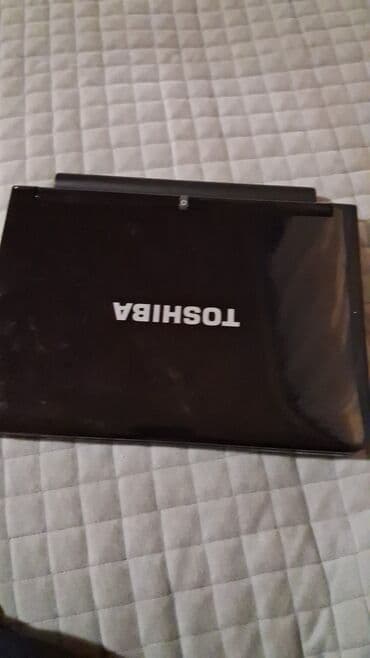 Toshiba noutbuk Xüsusiyyətlər: - Brend: Toshiba - Korpus: parlaq qara — 2