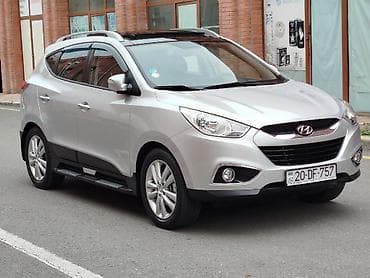 kia caren 2012: Hyundai ix35: 2 l | 2011 il Krossover — 8