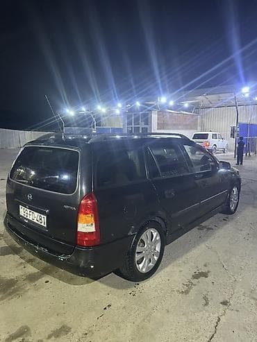 stanqa: Opel Astra Caravan (universał) – qara rəng, 5 qapı, geniş baqajlı ailə — 1