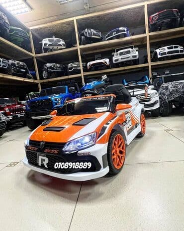 ucuz uşaq maşınları: Stokda İdman Avtomobili Volkswagen Polo K8 mavi və narıncı rənglərdə! — 2