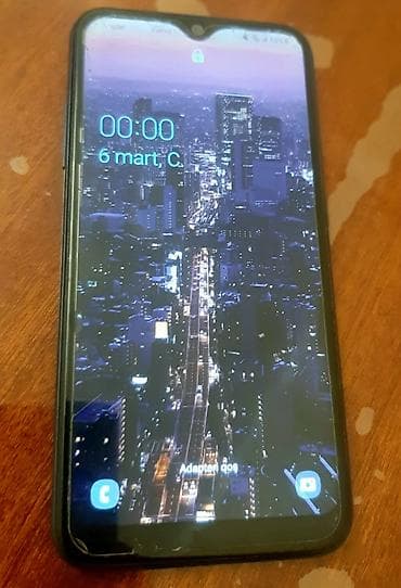 Samsung Galaxy A01, 16 ГБ, цвет - Синий, Сенсорный, Отпечаток пальца, Две SIM карты — 1