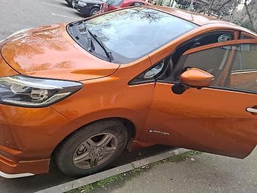 prada naocare: Nissan Note e-POWER, narıncı rəngli, şəhər üçün ideal hibrid (benzin — 3