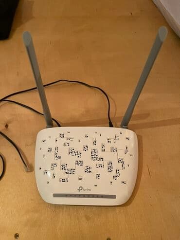 saz modem satilir: TP-Link tərəfindən hazırlanmış, iki anteni olan ağ rəngli simsiz — 2