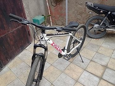 Книги и журналы: ZIGZAG dağ velosipedi - Çərçivə: yüngül alaşımlı, ağ-qara rəng — 1