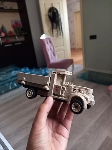 maraqli oyuncaqlar: LEGO tərzində yığılan Porsche yarış avtomobili modeli. Oyuncaq qara və — 8