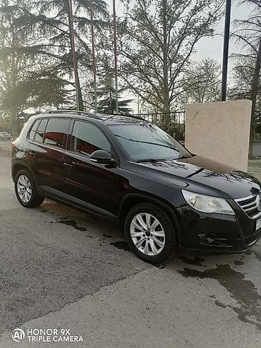 mercedes e 2: Volkswagen Tiguan: 2 l | 2009 il Ofrouder/SUV — 3
