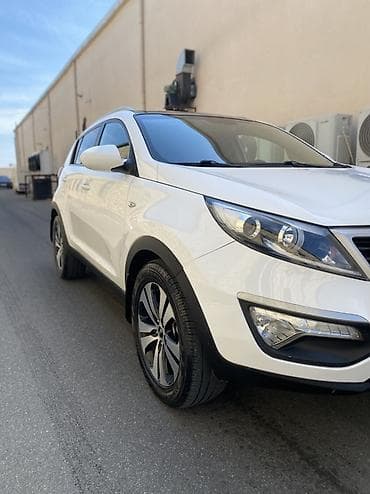 doogee dg550 dagger: Kia Sportage: 2 l | 2010 il Krossover — 1