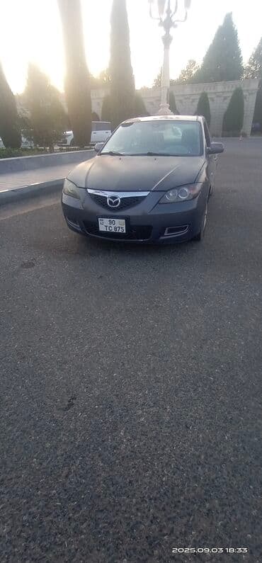 hediye qutusu: Mazda 3: 1.6 l | 2008 il Sedan — 2