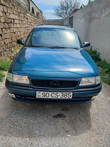 opel astra oluxanasi: Opel Astra F Caravan (universal), mavi rəng Xüsusiyyətlər:.1997 - — 9