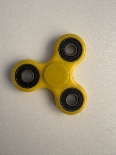 derjatel: Sarı rəngli fidget spinner - 3 qanadlı dizayn - Mərkəzdə və hər — 1
