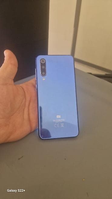 macbook 12: Xiaomi Mi 9 SE, 128 GB, rəng - Mavi, 
 Barmaq izi — 2