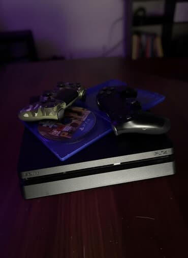 Sony PlayStation 4 Slim oyun konsolu Paket tərkibi: - PS4 Slim konsol