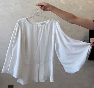 savis a e krem faydaları: Ağ rəngdə, yumru yaxalı və uzun qollu qadın bluzası. Bu bluzanın — 1