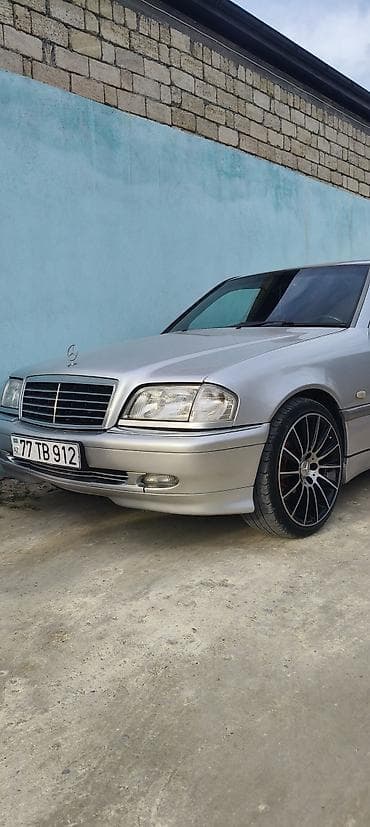 vaz 2107 kreditle: Mercedes-Benz C-sinfi (W202) sedan, gümüş rəng. - Mühərrik: benzin — 1