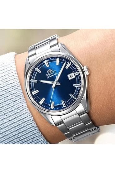 Orient avtomatik qol saatı – mavi sunburst siferblatlı, paslanmayan