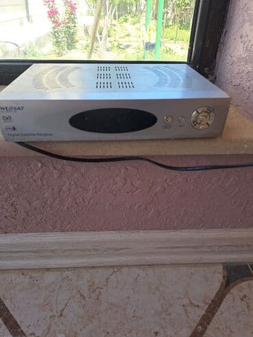 Neosat DVB Digital Peyk Qəbuledicisi. Gümüşü rəngdə olan bu cihaz lalafo.az -da Neosat DVB Digital Peyk Qəbuledicisi. Gümüşü rəngdə olan bu cihaz