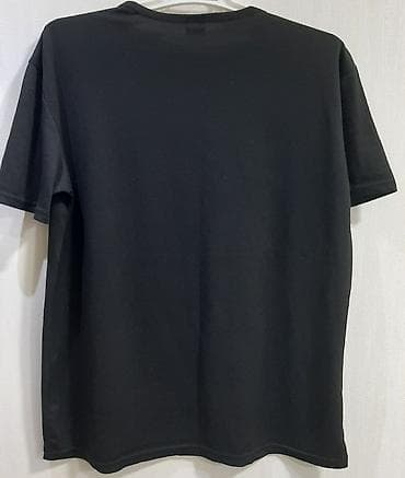 kişi geyimi: Qara qadın T‑şörtü – üzərində “Does this shirt make me look pregnant?” — 2