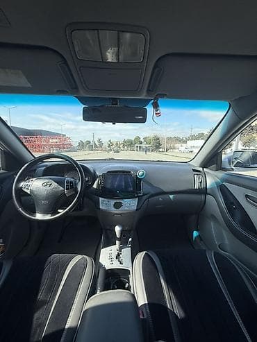 tesla model 3: Hyundai Elantra sedan – gümüşü rəng, Azərbaycan nömrə nişanı — 9