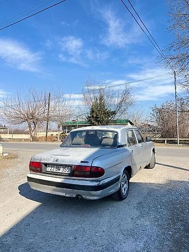 opel zafira a: QAZ 31105 Volga: 2.3 l | 2004 il 350350 km Sedan — 3