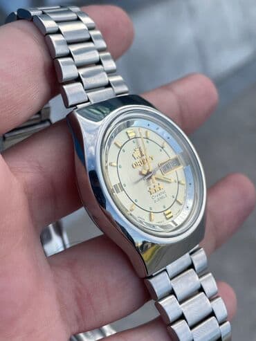 irshad telecom qol saatlari: İşlənmiş, Qol saatı, Orient, rəng - Qızılı — 4