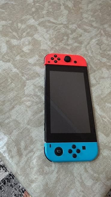 сколько стоит nintendo switch: Nintendo Switch konsolu – Neon Red/Neon Blue Joy-Con - Daşımaq üçün — 2