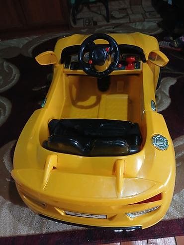 9 yasli usaqlar ucun donlar: Uşaq üçün elektrikli maşın – sarı rəngli sport kabriolet - İki — 2