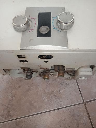 Краны водонагреватели: Qazla işləyən axın tipli suqızdırıcı (kolonka) Xüsusiyyətlər: - Üst — 1