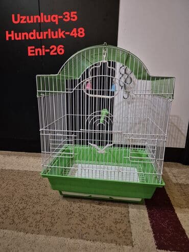 Quş qəfəsi Ölçülər: - Uzunluq: 35 sm - Hündürlük: 48 sm - En: 26 sm