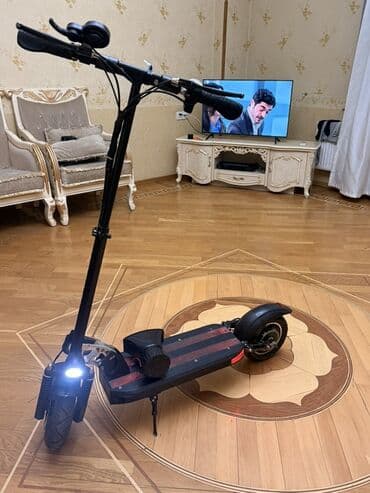 elektirikli skuter: Elektrik skuter kugo-m4 suret 45 7 ay surubler cox idial vezyete hec — 1