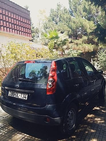 w210 disk: Ford Fiesta hatchback, 2007 il 1.3 matortünd göy rəng. 5 qapı, kompakt — 3