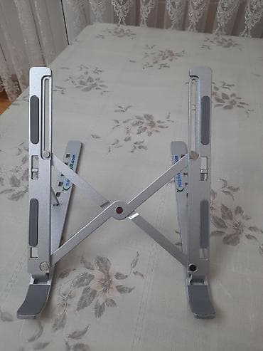 for x: Məhsul: Laptop Stand – Creative Folding Storage Bracket salam əziz — 7