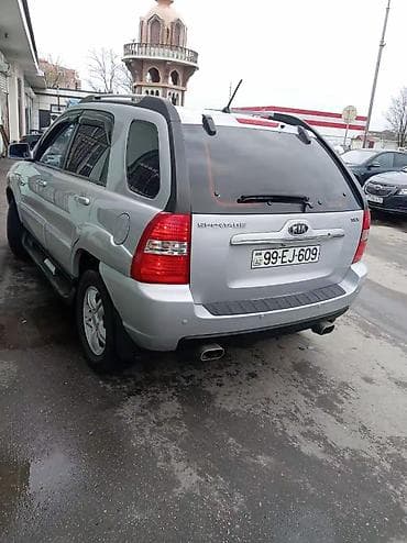 volkswagen tiguan ii: Kia Sportage: 2 л | 2007 г. Универсал — 3