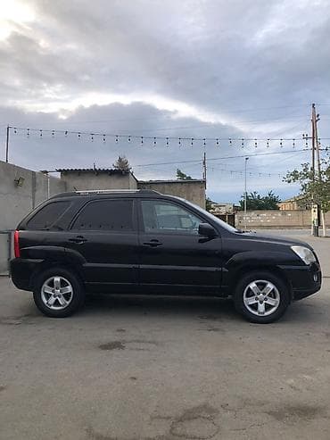 larzon disk: Kia Sportage: 2.7 l | 2009 il Ofrouder/SUV — 2