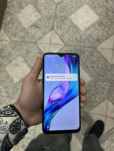 ayfon 6 pulus: Xiaomi Redmi 9C (mavi rəng) - Ekran: 6.53" HD+ (720×1600), damcı — 3