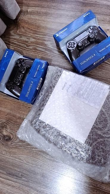 radioidarəedici dəstlər: 10 oyun +16 disk Sony PlayStation 4 Slim – 500 GB Xüsusiyyətlər: - — 4