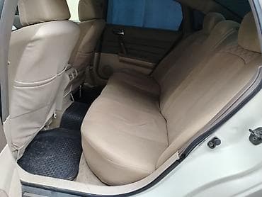 rio 1 5: Nissan Teana – ağ rəngli, geniş salonlu biznes-seqment sedan. Texniki — 2