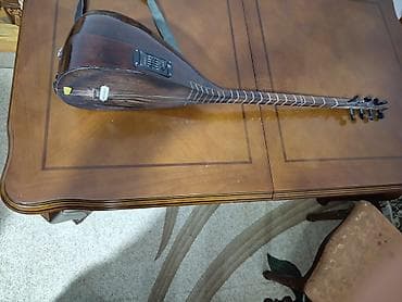 mor ve otesi bilet: - Alət: Saz elektro - Korpus: Tünd ağac, laklı örtük - Elektronika — 2