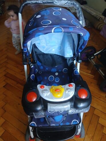 Uşaq arabası – mavi rəngli, dairə naxışlı Xüsusiyyətlər: - Tam