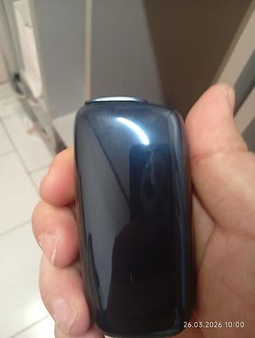 metan balonu: Minimalist dizayna malik, tünd rəngli, parlaq səthli çoxməqsədli kiçik — 1