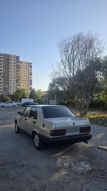 avcarka satılır: Model: Tofaş Şahin (sedan) Rəng: Gümüşü/boz, qara bamperlər Kuzov: 4 — 2