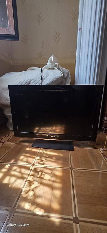 LG LCD televizor - Ekran: təxminən 32" (80 sm ətrafı), geniş ekran - — 1