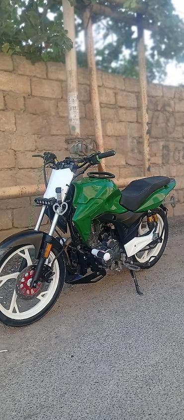 mini cps: Modifikasiya olunmuş şəhər/naked tərzli motosiklet Xüsusiyyətlər: - — 5