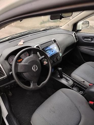 06 maşını: Nissan Wingroad: 1.5 l | 2014 il Van/Minivan — 4