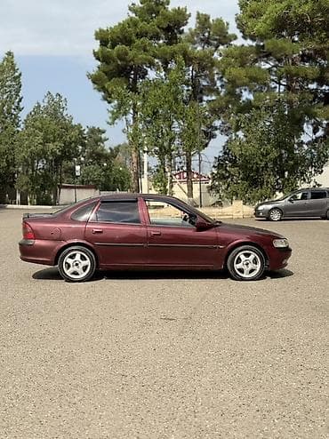 opel astra k: Opel Vectra: 1.8 l | 1996 il 1235000 km Sedan — 6