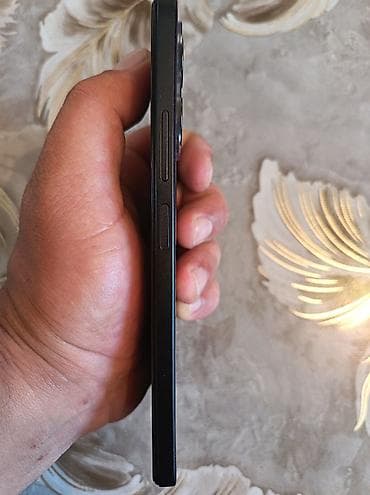 philips xenium 9@9h: Xiaomi Redmi smartfon - Arxa paneldə “Redmi” loqosu, kvadrat formalı — 4