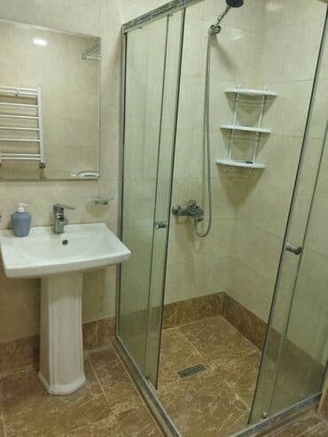 Qarajlar: Salam.Ev Saray MTK-da 15 mərtəbəli binanın 10-cu mərtəbəsində — 12