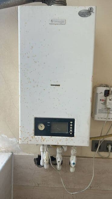yemey qizdiran: İşlənmiş Kombi Termogas 24 kVt, Ünvandan götürmə — 1